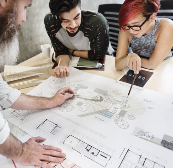 Group of people discussing site charts