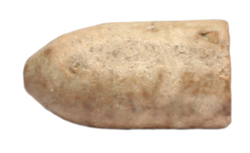 An old bullet. It appears to be brass.