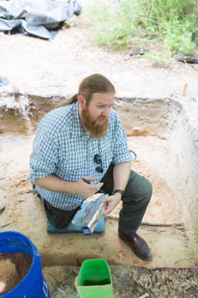 Assistant Professor of Anthropology, Ryan McNutt, Ph.D., works on an archeological project at Camp Lawton, a site in Jenkins County near the setting of the upcoming project.