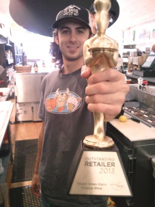 Morgan Murphy ('11) holds the 2013 Outstanding Retailer award from Specialty Food Magazine.