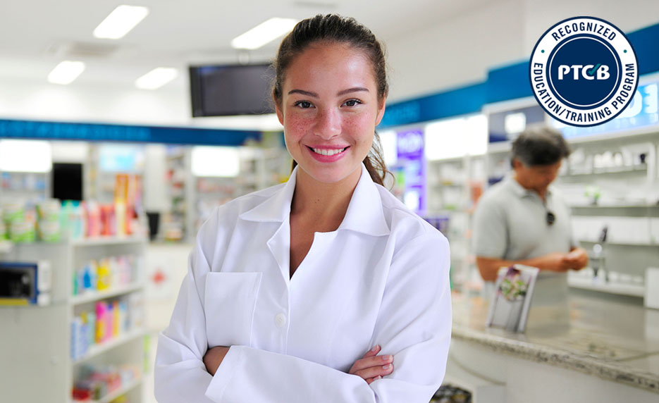 Smiling female pharmacist in a white coat stands in a bright pharmacy, badge for PTCB recognized education program visible in the corner.